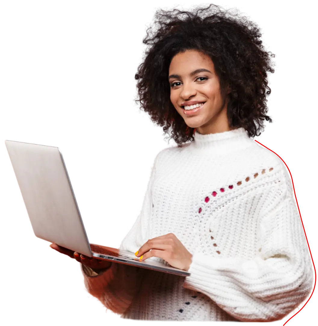 girl in white holding laptop