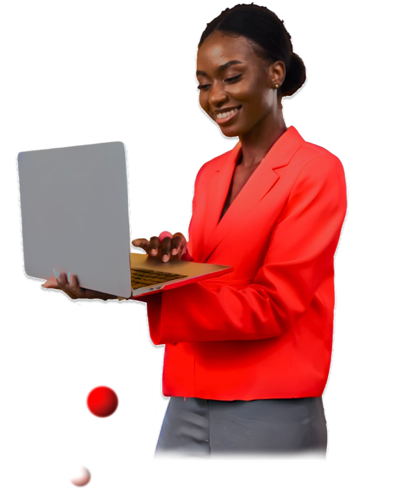 woman in red holding laptop